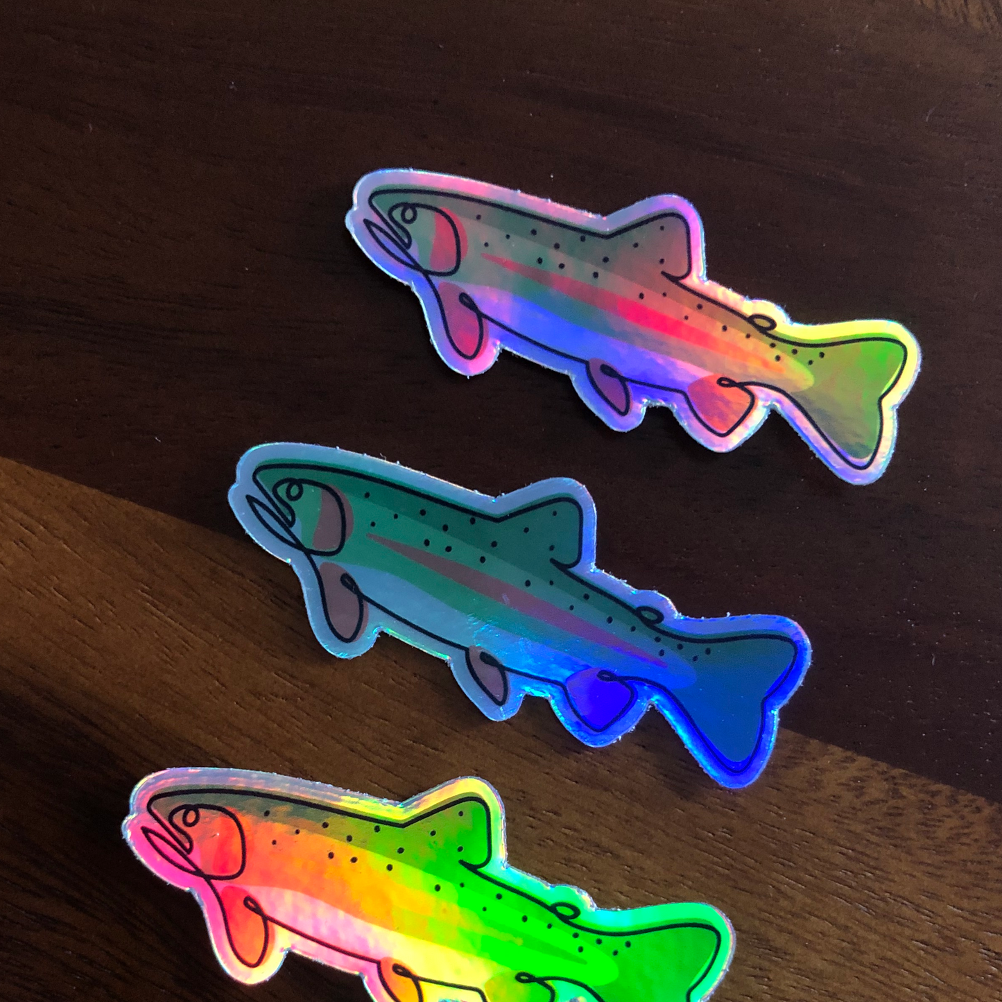 Thunderbird Outdoor SupplyRainbow Trout - Single Line Holographic DecalRainbow Trout - Single Line Holographic Decal
Single Line Contour Illustration of a Rainbow Trout. Weatherproof holographic stickers perfect for your laptop, water bottle, car or whatever else you can stick it 